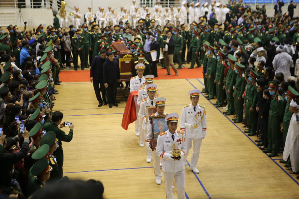 Lễ di quan 22 liệt sỹ Đoàn Kinh tế Quốc phòng 337. (Ảnh: Hồ Cầu/TTXVN)