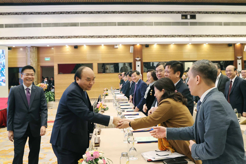 Thủ tướng Nguyễn Xuân Phúc với các đại biểu dự hội nghị. (Ảnh: Thống Nhất/TTXVN)