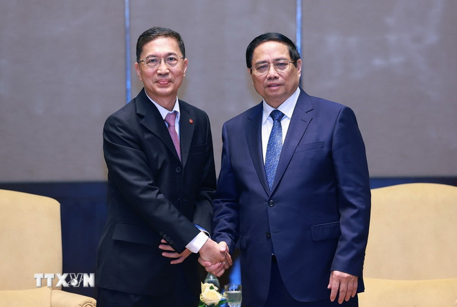 Thủ tướng Phạm Minh Chính làm việc với các doanh nghiệp hàng đầu Malaysia - Ảnh 1.