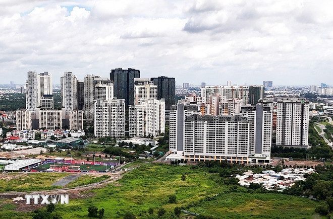 Hyrespriserna för kommersiell mark i Ho Chi Minh-staden ökar. (Foto: Hong Dat/VNA) ttxvn-thue-dat-2.jpg