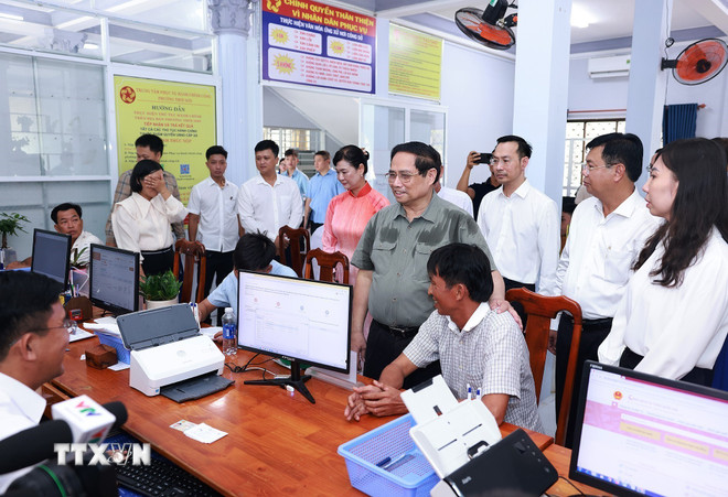 Năm nhiệm vụ, giải pháp trọng tâm để bảo đảm tăng trưởng đạt 8,3-8,5% ttxvn-thu-tuong-an-giang-chinh-quyen-2-cap-8.jpg