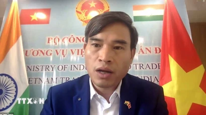 Ông Bùi Trung Thướng, Tham tán thương mại Đại sứ quán Việt Nam tại Ấn Độ phát biểu tại hội thảo. (Ảnh: Ngọc Thúy/TTXVN)