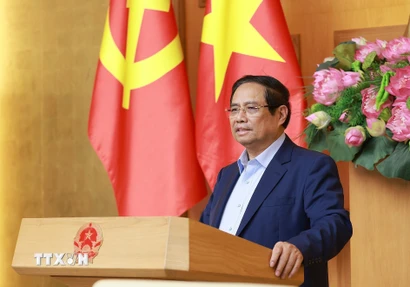 Thủ tướng Phạm Minh Chính phát biểu tại buổi làm việc với Ban Nghiên cứu phát triển kinh tế tư nhân (Ban IV). (Ảnh: Dương Giang/TTXVN)
