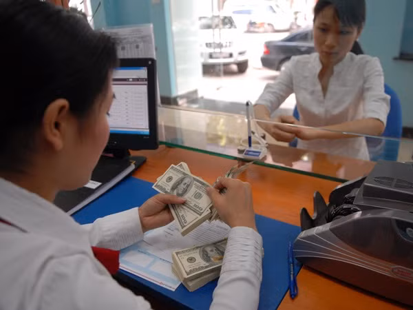 Tỷ giá tăng mạnh ngay từ những ngày đầu năm. (Ảnh: PV/Vietnam+)