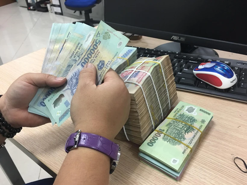 Ngân hàng Nhà nước bơm trả toàn bộ tiền hút qua tín phiếu. (Ảnh: PV/Vietnam+)