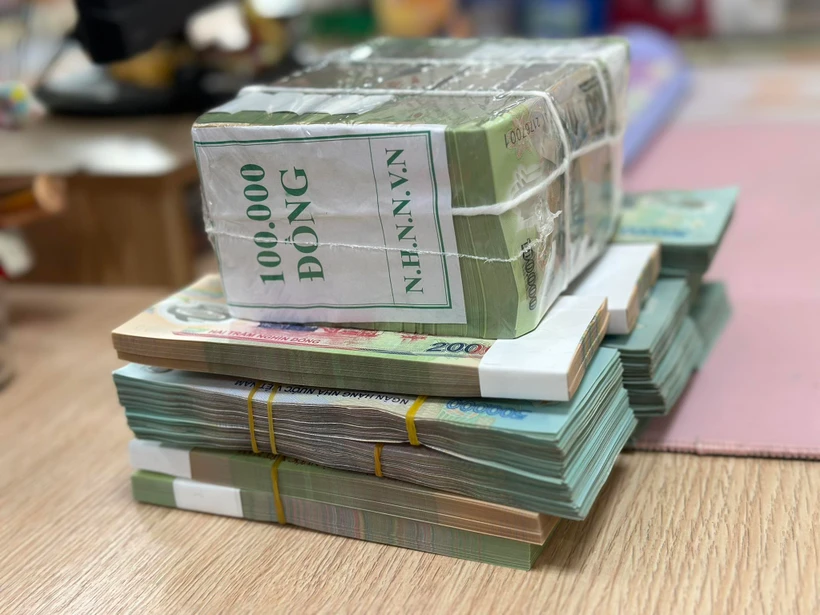 Ngân hàng Nhà nước thông tin vế ngân hàng mua bắt buộc và kiểm soát đặc biệt. (Ảnh: Vietnam+)