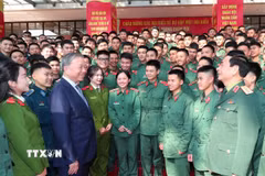 Tổng Bí thư Tô Lâm, Bí thư Quân ủy Trung ương dự chương trình Gặp mặt đại biểu thế hệ trẻ trong Quân đội chiều 18/12/2024. (Ảnh: Trọng Đức/TTXVN)