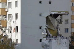 Vụ nổ gây hư hại 2 tầng của một tòa nhà chung cư. (Nguồn: EPA)