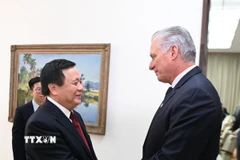 Bí thư thứ nhất, Chủ tịch Cuba Miguel Díaz-Canel Bermúdez tiếp ông Nguyễn Xuân Thắng, Ủy viên Bộ Chính trị, Giám đốc Học viện Chính trị Quốc gia Hồ Chí Minh, Chủ tịch Hội đồng Lý luận Trung ương. (Ảnh: Việt Hùng/TTXVN)