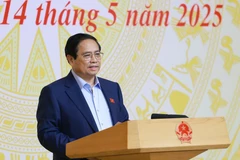 Thủ tướng Phạm Minh Chính chủ trì cuộc họp về công tác chống buôn lậu, gian lận thương mại, hàng giả. (Ảnh: Dương Giang/TTXVN)