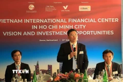 Ông Hoàng Nguyên Dinh, Phó Chủ tịch UBND Thành phố Hồ Chí Minh, phát biểu tại sự kiện “Trung tâm Tài chính Quốc tế Việt Nam tại Thành phố Hồ Chí Minh: Tầm nhìn và Cơ hội đầu tư." (Ảnh: Anh Hiển/TTXVN)