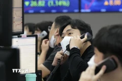 Thị trường chứng khoán châu Á đã tăng lên mức cao nhất trong sáu tuần vào phiên ngày 26/12. (Ảnh: AFP/TTXVN)