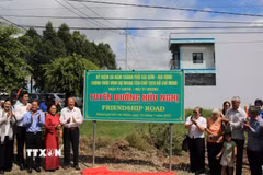 Khánh thành "Tuyến đường hữu nghị" mang tên Mẹ Việt Nam Anh hùng Phan Thị So tại xã Củ Chi, Thành phố Hồ Chí Minh. (Ảnh: Liên Sơn/TTXVN)