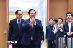 Thủ tướng Phạm Minh Chính đến dự Hội nghị toàn quốc tổng kết công tác đối với người Việt Nam ở nước ngoài. (Ảnh: Dương Giang/TTXVN)