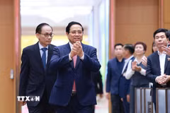 Thủ tướng Phạm Minh Chính đến dự Hội nghị toàn quốc tổng kết công tác đối với người Việt Nam ở nước ngoài. (Ảnh: Dương Giang/TTXVN)