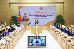 Hội nghị triển khai nhiệm ngoại giao kinh tế năm 2025 tại điểm cầu Hà Nội. (Ảnh: Dương Giang/TTXVN)