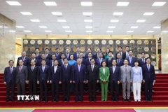Tổng Bí thư Tô Lâm cùng Chủ tịch Quốc hội Hàn Quốc Woo Won Sik và các đại biểu chụp ảnh chung. (Ảnh: Thống Nhất/TTXVN)