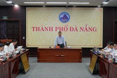 Quang cảnh Hội nghị tập huấn công tác triển khai vận hành thử nghiệm hoạt động của phường, xã mới, được tổ chức trực tiếp kết hợp trực tuyến tới các địa phương của thành phố Đà Nẵng và tỉnh Quảng Nam. (Ảnh: Quốc Dũng/TTXVN)