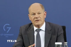 Thủ tướng Đức Olaf Scholz trong cuộc họp báo tại Berlin. (Ảnh: Kyodo/TTXVN)