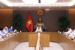 Phó Thủ tướng Trần Hồng Hà chủ trì buổi làm việc. (Ảnh: Văn Điệp/TTXVN)