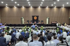 Quang cảnh phiên tòa. (Ảnh: Kim Anh/TTXVN)