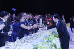 Chủ tịch nước Lương Cường chào mừng các Trưởng đoàn tham dự Lễ mở ký Công ước Hà Nội. (Ảnh: Lâm Khánh/TTXVN)