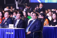 Thủ tướng Phạm Minh Chính dự Chương trình nghệ thuật chào mừng kỷ niệm 100 năm Ngày Báo chí cách mạng Việt Nam và trao Giải Báo chí Quốc gia lần thứ XIX năm 2024. (Ảnh: Dương Giang/TTXVN)