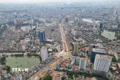 Dự án đường Vành đai 1 đoạn Hoàng Cầu-Voi Phục (Hà Nội) với tổng mức đầu tư khoảng 7.200 tỷ đồng đang được các đơn vị thi công đẩy nhanh tiến độ. (Ảnh: Lê Đông/TTXVN)