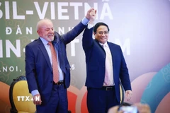 Thủ tướng Phạm Minh Chính và Tổng thống Brazil Luiz Inácio Lula da Silva tham dự Diễn đàn kinh tế Việt Nam-Brazil. (Ảnh: Dương Giang/TTXVN)