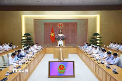 Thủ tướng Lê Minh Hưng chủ trì buổi làm việc với lãnh đạo Bộ Công Thương và các bộ, ngành về tháo gỡ khó khăn, thúc đẩy sản xuất kinh doanh. (Ảnh: Dương Giang/TTXVN)