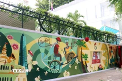 Bức tranh tường cổ động tình hữu nghị Việt Nam-Cuba. (Ảnh: Xuân Khu/TTXVN)