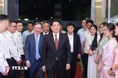 Chủ tịch nước Lương Cường đến dự Lễ tôn vinh, trao danh hiệu Nông dân Việt Nam xuất sắc và Nhà khoa học của nhà nông năm 2025. (Ảnh: Lâm Khánh/TTXVN)