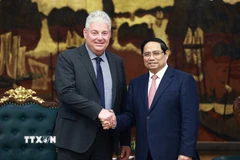 Thủ tướng Phạm Minh Chính tiếp ông Eduard Stiphout - Phó Chủ tịch Cấp cao, Tập đoàn ASML (Hà Lan). (Ảnh: Dương Giang/TTXVN)