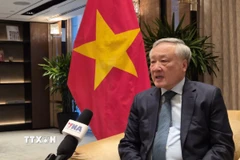 Phó Thủ tướng Thường trực Nguyễn Hòa Bình trả lời phỏng vấn của phóng viên TTXVN tại Singapore. (Ảnh: Việt Dũng/TTXVN)