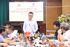 Nhà báo Lê Quốc Minh, Ủy viên Trung ương Đảng, Tổng Biên tập Báo Nhân Dân, Phó Trưởng Ban Tuyên giáo và Dân vận Trung ương, Chủ tịch Hội Nhà báo Việt Nam, Chủ tịch Hội đồng chung khảo điều hành thảo luận họp Hội đồng chung khảo vào chiều 29/7. (Nguồn: Công an Nhân dân)