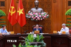 Thủ tướng Phạm Minh Chính chủ trì cuộc họp Thường trực Chính phủ về trung tâm tài chính quốc tế tại Thành phố Hồ Chí Minh và Đà Nẵng. (Ảnh: Dương Giang/TTXVN)