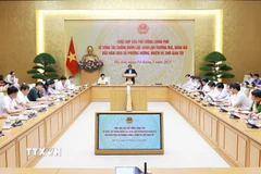 Thủ tướng Phạm Minh Chính chủ trì cuộc họp về công tác chống buôn lậu, gian lận thương mại, hàng giả. (Ảnh: Dương Giang/TTXVN)