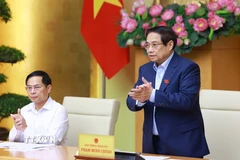 Thủ tướng Phạm Minh Chính chủ trì cuộc họp về công tác chống buôn lậu, gian lận thương mại, hàng giả. (Ảnh: Dương Giang/TTXVN)