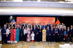 Tổng Bí thư Tô Lâm với bà con cộng đồng người Việt Nam tại Hoa Kỳ. (Ảnh: Thống Nhất/TTXVN)