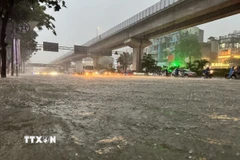 Một điểm ngập trên đường Nguyễn Trãi, Hà Nội. (Ảnh: Quốc Lũy/TTXVN)