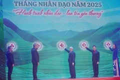 Các đại biểu tham gia nghi thức phát động chương trình. (Ảnh: Thu Hương/TTXVN)