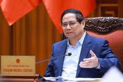 Thủ tướng Phạm Minh Chính chủ trì cuộc họp về việc Hoa Kỳ áp mức thuế đối ứng lên hàng hóa nhập khẩu từ Việt Nam. (Ảnh: Dương Giang/TTXVN)