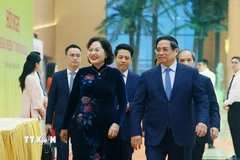 Thủ tướng Phạm Minh Chính đến dự hội nghị. (Ảnh: Dương Giang/TTXVN)