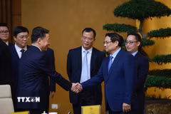Thủ tướng Phạm Minh Chính tiếp ông Vi Thao, Chủ tịch Khu tự trị dân tộc Choang Quảng Tây, Trung Quốc và đoàn doanh nghiệp sang thăm và làm việc tại Việt Nam. (Ảnh: Dương Giang/TTXVN)