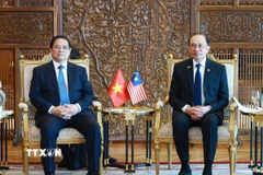 Thủ tướng Phạm Minh Chính hội đàm hẹp với Thủ tướng Malaysia Anwar Ibrahim. (Ảnh: Dương Giang/TTXVN)