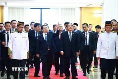 Thủ tướng Phạm Minh Chính hội kiến Chủ tịch Thượng viện Malaysia Awang Bemee Awang Ali Basah. (Ảnh: Dương Giang/TTXVN)