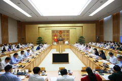 Cuộc họp giữa Đảng ủy Chính phủ và Đảng ủy Quốc hội nhằm chuẩn bị cho Kỳ họp thứ 10, Quốc hội khóa XV. (Ảnh: Dương Giang/TTXVN)