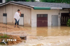 Cảnh ngập lụt sau những trận mưa lớn tại tỉnh Songkhla, Thái Lan. (Ảnh: THX/TTXVN)