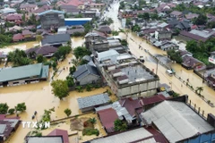 Khu vực bị ngập lụt tại tỉnh Aceh, Indonesia ngày 27/11/2025. (Ảnh: THX/TTXVN)