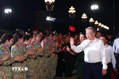 Tổng Bí thư Tô Lâm dự Chương trình chính luận nghệ thuật 'Dưới cờ vinh quang' tại điểm cầu Quảng trường Ba Đình (Hà Nội). (Ảnh: Trọng Đức/TTXVN)